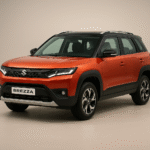 Maruti Suzuki Brezza in dual-tone orange and black color with bold front grille and LED headlights